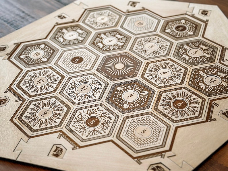 May include: A wooden game board with a hexagonal grid pattern. Each hexagon has a unique design and a number from 1 to 12. The board is made of light wood with a brown stain.