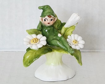 Vintage Kitschy Napcoware Bone Chine Pixie Elf Sitting on White Daisy Flowers Figurine