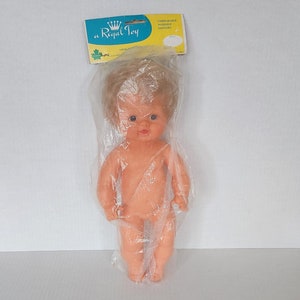 Sun Rubber Doll - Etsy