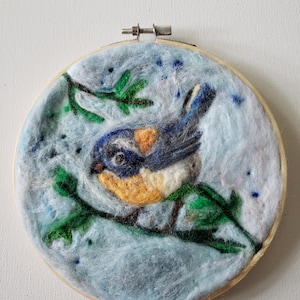 Hand Crafted Wool-Art Needle Felted Colorful Bird Wall Hanging. Circular 6.25 in. across and 1/2 in deep with bamboo frame. Wall Decor.