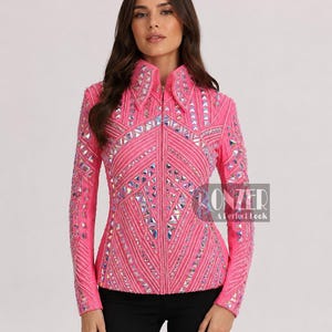 Close up of premium rhinestone craftsmanship on custom rodeo jacket with reflective crystal embellishments