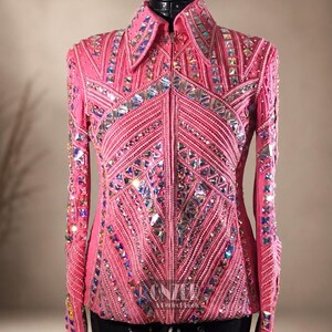 Detailed sleeve embroidery on western show jacket featuring handcrafted crystal accents and premium stitching