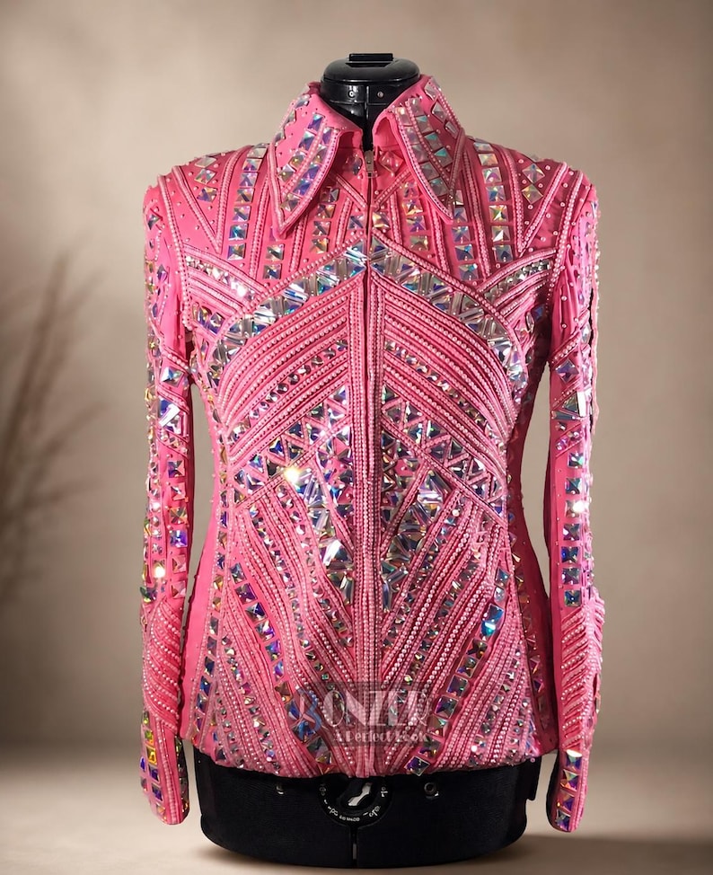 Detailed sleeve embroidery on western show jacket featuring handcrafted crystal accents and premium stitching