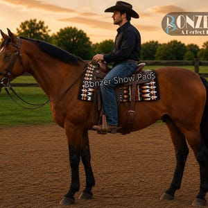 Black and tan cowboy saddle pad with handwoven southwestern design