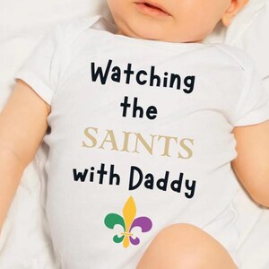 Watching the Saints with Daddy Perfect for Game Day Baby Shower Gift Baby Football Fans New Parents Infant Clothing New Orleans Baby