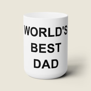May include: White ceramic mug with black text that reads "WORLD'S BEST DAD".