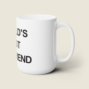 May include: White ceramic mug with black text that reads "World's Best Friend".