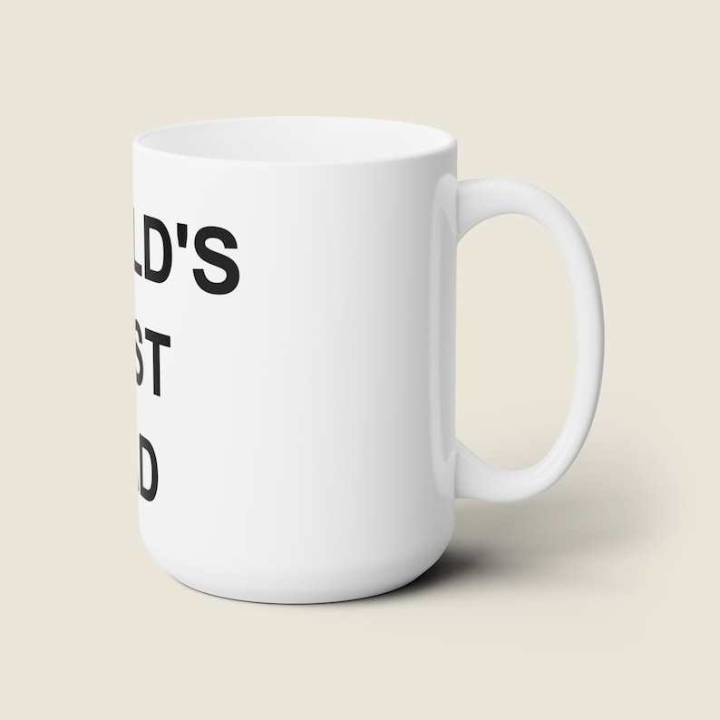 May include: White ceramic mug with black text that reads "World's Best Dad".