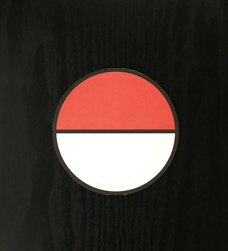 May include: A circular sticker featuring a red top half and a white bottom half, separated by a horizontal black line. The sticker has a thin black border and includes the small white text natronicart.etsy.com at the bottom.