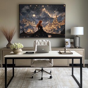 May include: A home office with a white desk and black metal legs. A white office chair with a tufted back sits in front of a laptop computer. A framed print of a woman standing in a fantasy city with a starry sky hangs on the wall above the desk. A lamp with a white shade and a silver base sits on a side table.