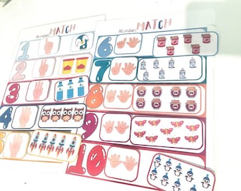 May include: A colorful educational matching game for kids. The game features numbers 1 through 10, with corresponding images of fingers, penguins, jars of jam, candles, butterflies, and rockets. The game is designed to help children learn to count and match numbers with quantities.