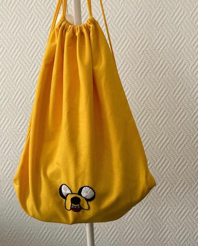 Mochila jake el perro sale