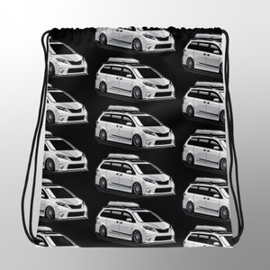 May include: Black drawstring bag featuring a repeating pattern of white minivans. Some vans have roof racks. The vans are depicted in a cartoon style with detailed headlights and rims. The bag has a black and white drawstring.