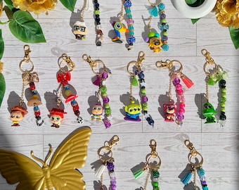 Pixar Doorable Beaded, Charmed Keychain - Monsters Inc., Up, & Toy Story