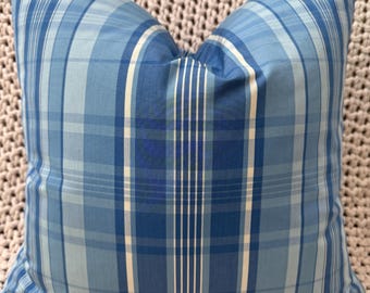 May include: Blue and white plaid pillow cover with a subtle sheen. The pillow cover is made of a soft, woven fabric.