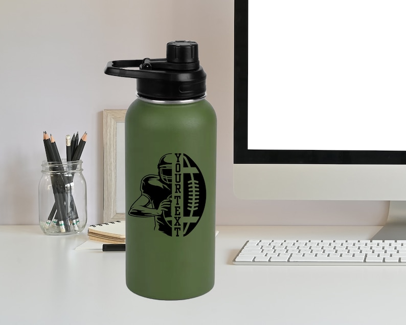 May include: Green stainless steel water bottle with a black lid and a black graphic of a football player and football. The graphic includes the text "YOUR TEXT".