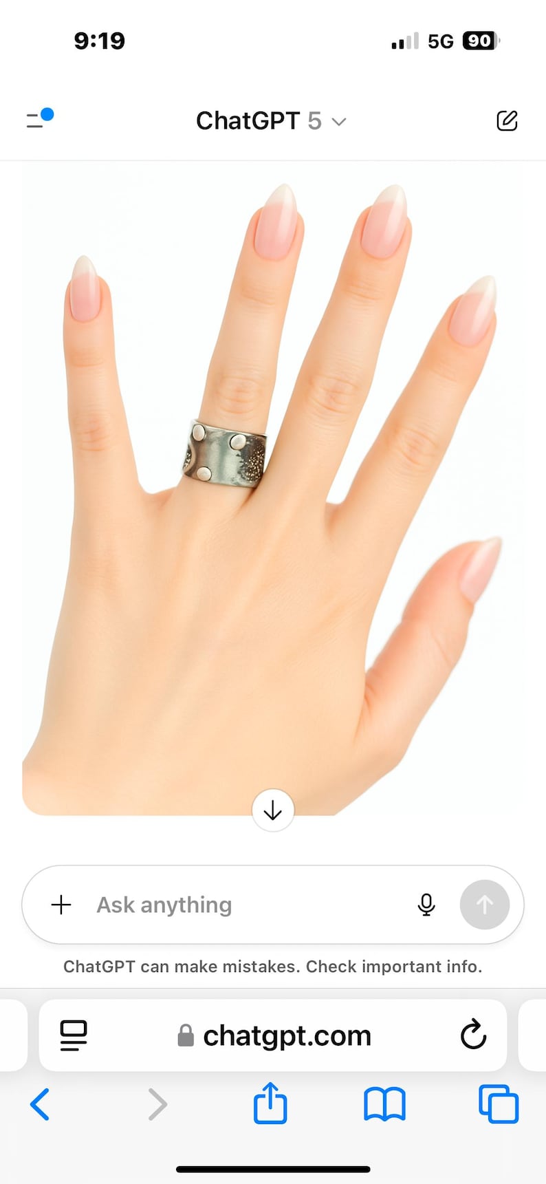 May include: A silver-toned ring with a textured design and circular accents is displayed on a hand with manicured nails. The ring appears to be made of metal and has a unique, artistic style.
