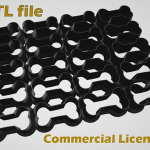 May include: STL file for a 3D printable set of 36 black bone-shaped cookie cutters. Commercial License.