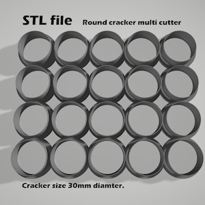 May include: A 3D-rendered image of a grid of gray, circular cookie cutters. The text at the top reads "STL file Round cracker multi cutter." The bottom text indicates a cracker size of 30mm diameter, approximately 1.2 inches.