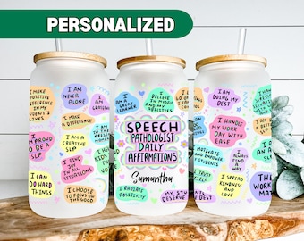 May include: Three clear glass tumblers with colorful motivational quotes and affirmations. The tumblers have a bamboo lid and a straw. The middle tumbler has the text "Speech Pathologist Daily Affirmations Samantha".