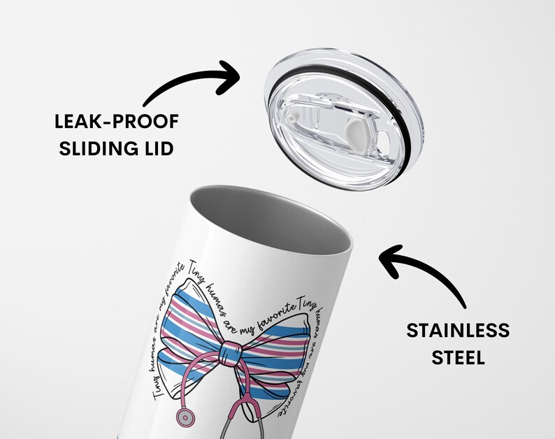 May include: White stainless steel tumbler with a pink and blue striped bow and stethoscope design. The tumbler has a leak-proof sliding lid. The text on the tumbler reads "Tiny humans are my favorite Tiny humans are my favorite".