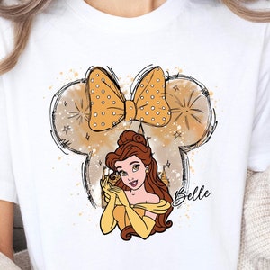 ディズニー ベル シャツ、ディズニー キャッスル、水彩画、ディズニー プリンセス ベル シャツ、ミニー マウス ヘッド テーマ、ディズニー マッチング、プリンセス ベル シャツ。