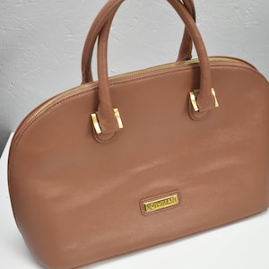 Joy and iman bags sale