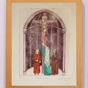 May include: A framed print of a religious scene depicting a figure on a cross with two figures standing below. The print is titled "Crucifix For Now" and is signed by the artist.