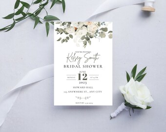 May include: A white bridal shower invitation with green floral accents. The invitation reads "You're Invited Kelsey Smith Bridal Shower June 12, 2023 at 1 PM Howard Hall 123 Anywhere St., Any City RSVP by 30-10-2023"