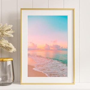 Pastel ocean sunset artwork capturing a quiet shoreline and tranquil sea at dusk.
