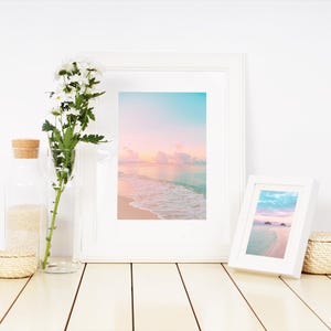 Beach cottage wall decor set of two with dreamy pastel skies and gentle waves, soothing sunrise-inspired artwork for a living room or bedroom.