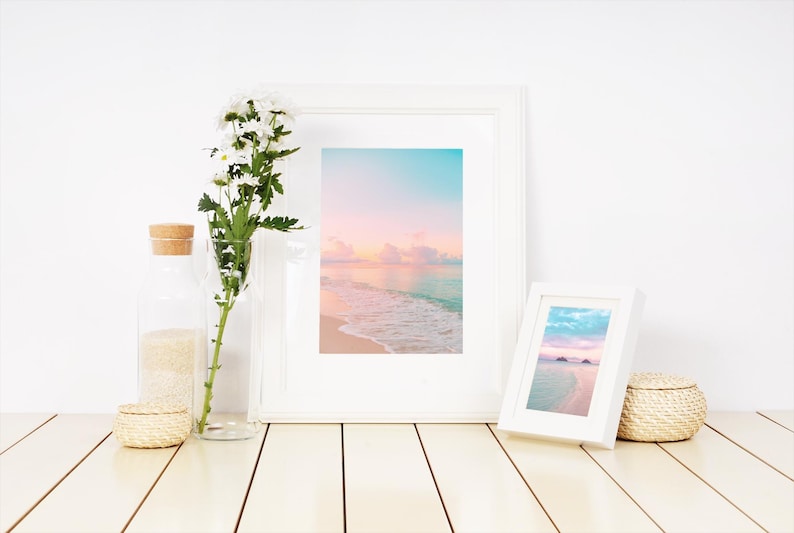 Beach cottage wall decor set of two with dreamy pastel skies and gentle waves, soothing sunrise-inspired artwork for a living room or bedroom.