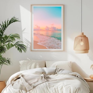 Peaceful ocean photography featuring a pastel sunset over calm waves, ideal for beach house decor.