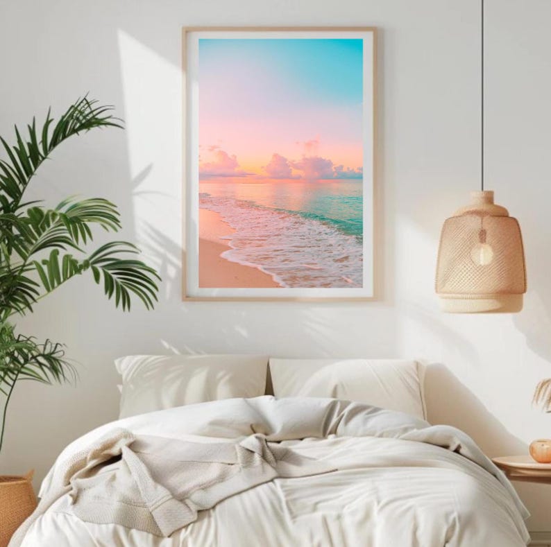 Peaceful ocean photography featuring a pastel sunset over calm waves, ideal for beach house decor.