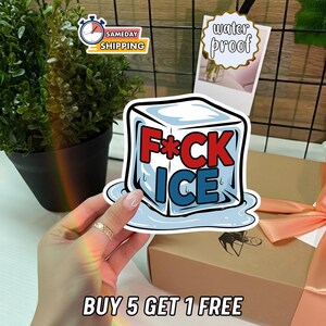 May include: A sticker with the words "F*CK ICE" in red and blue, designed to look like a melting ice cube. The sticker is held by a hand. The image also includes a "waterproof" sticker and a "SAMEDAY SHIPPING" sticker.