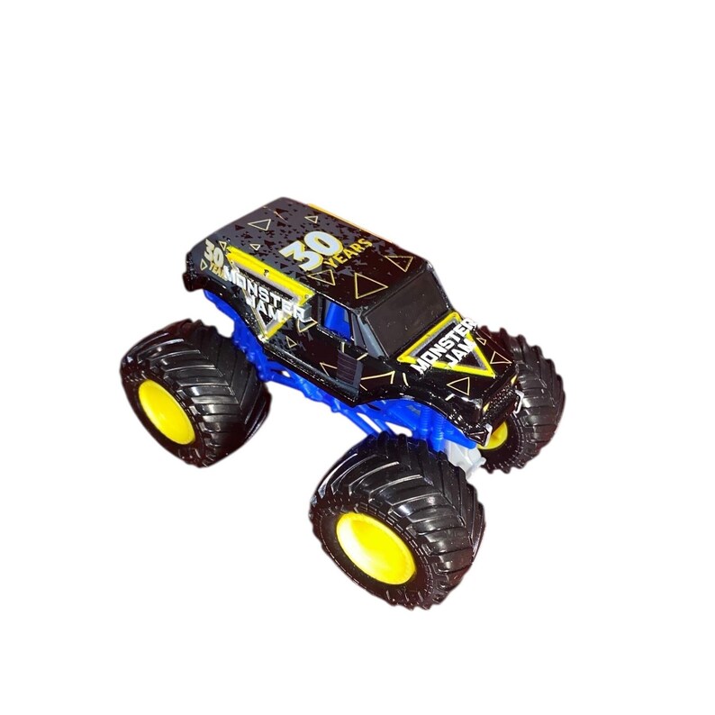 May include: A black and blue Monster Jam truck toy with yellow accents. The truck has large black tires with yellow rims and the text "30 YEARS" and "MONSTER JAM" on the body.