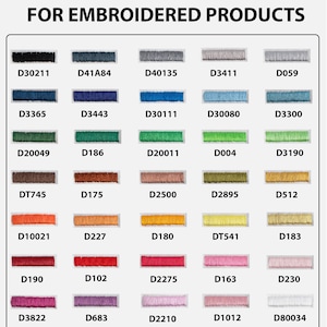 May include: A color chart titled NEW STITCH COLORS FOR EMBROIDERED PRODUCTS, displaying thirty-five rectangular swatches of embroidery thread in various shades, each labeled with a unique alphanumeric code such as D30211, D41A84, and D80034.