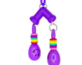 Double Trouble: Mini Maraca de Plástico para Pássaros e Papagaios