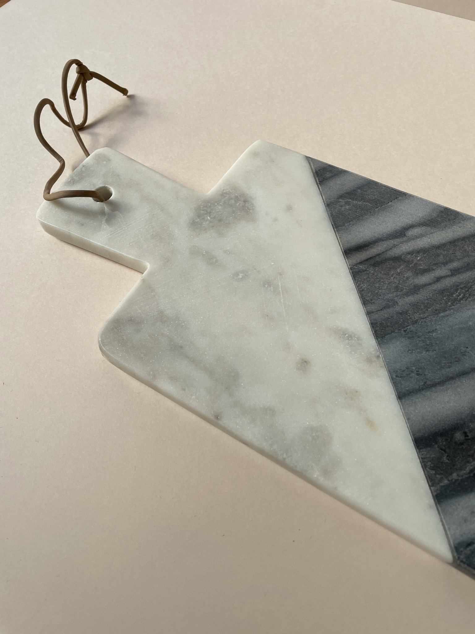 White and Grey Marble Chopping Board With Handle and Leather Cord