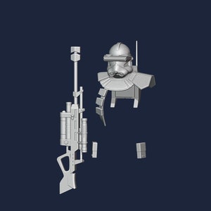 Puede incluir: Un modelo impreso en 3D de un soldado clon de Star Wars con un rifle de francotirador. El modelo está desmontado en varias piezas, incluyendo la cabeza, el torso, las piernas y el rifle.