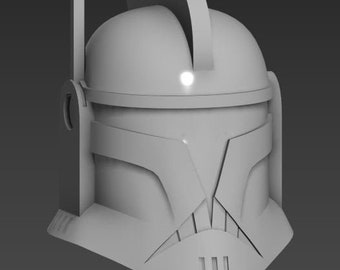May include: A white plastic model of a Star Wars clone trooper helmet. The helmet has a distinctive design with a raised crest and a visor.