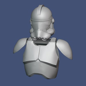May include: A gray, three-dimensional model of a Clone Trooper helmet and chest armor. The helmet features a distinctive visor and ventilation details. The chest armor includes shoulder pauldrons and a detailed front plate, all rendered in a neutral gray color.