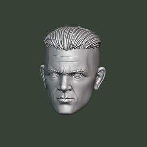 May include: A 3D-rendered, grayscale bust of a man's head. The sculpture features a stern expression, furrowed brow, and short, textured hair. The background is a solid, muted green.
