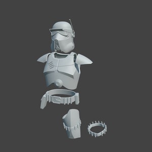 Peut inclure: Un modèle de soldat clone de Star Wars en plastique blanc démonté. Le modèle comprend un casque, une plaque de poitrine, une ceinture, une protection de jambe et un bracelet.