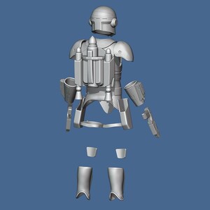 K&ouml;nnte beinhalten: Ein zerlegter Modellbausatz eines Mandalorianer-Charakters aus dem Star Wars-Universum. Der Bausatz enth&auml;lt einen Helm, einen Torso, Arme, Beine und einen Jetpack. Das Modell ist aus grauem Kunststoff.