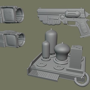 May include: A 3D printed model of a futuristic sci-fi gun, a radio with vacuum tubes, and two small screens with the text "Pip-Boy 2000" on them.