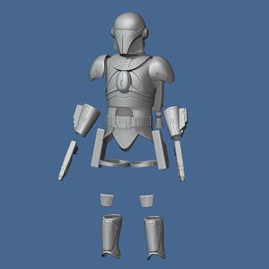 K&ouml;nnte beinhalten: Eine zerlegte graue Plastik-Actionfigur eines Mandalorianer-Kriegers. Die Figur besteht aus mehreren Teilen, darunter Helm, Torso, Arme, Beine und Waffen.