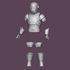 May include: A disassembled, gray futuristic armor set, including a helmet, torso, arm, leg, and waist components. The armor has a sleek, angular design, suggesting a sci-fi or cosplay theme. The pieces are arranged against a muted purple background.