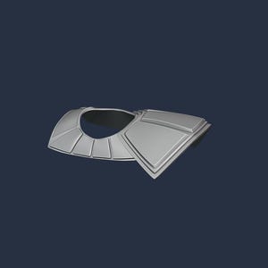May include: A silver-colored shoulder armor piece with a geometric design. The armor has a collar-like section with vertical lines and a rectangular section with layered panels. The background is a dark blue.