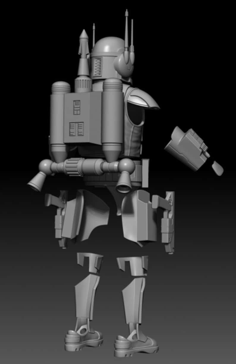 Puede incluir: Un kit de modelo de pl&aacute;stico gris de un personaje de Star Wars con un jetpack y un bl&aacute;ster. El modelo est&aacute; desmontado y las piezas est&aacute;n dispuestas sobre una superficie gris.